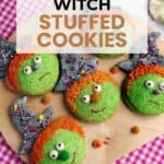 Five green cookies decorated as witches with candy eyes and orange sprinkle hair are arranged on a pink checkered cloth, with "Halloween Witch Stuffed Cookies" text overlaid.