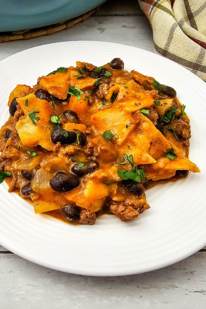 Beef enchilada casserole on a white plate.